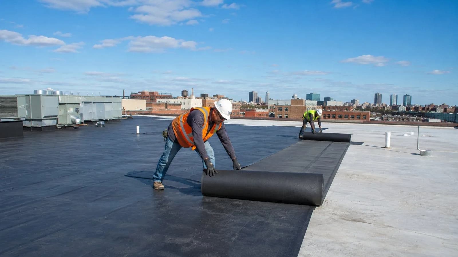 Rooftop rubber flooring staged across a data center roof
