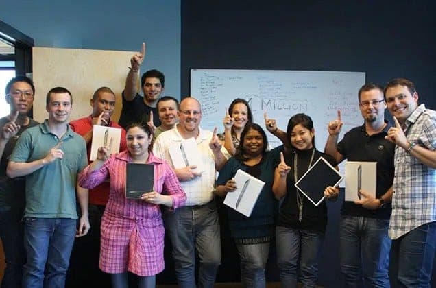 The FlooringInc team gathered in the office