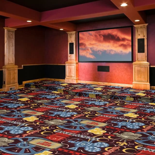 Home theater with Joy Carpets Camera Ready Carpet, patterned with film reels and tickets