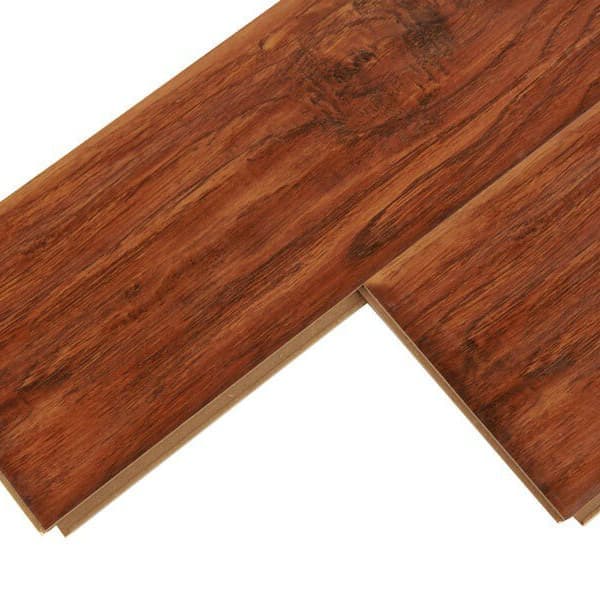 Royal Oak 12mm wood-look laminate flooring planks with medium reddish-brown oak grain and beveled edges.