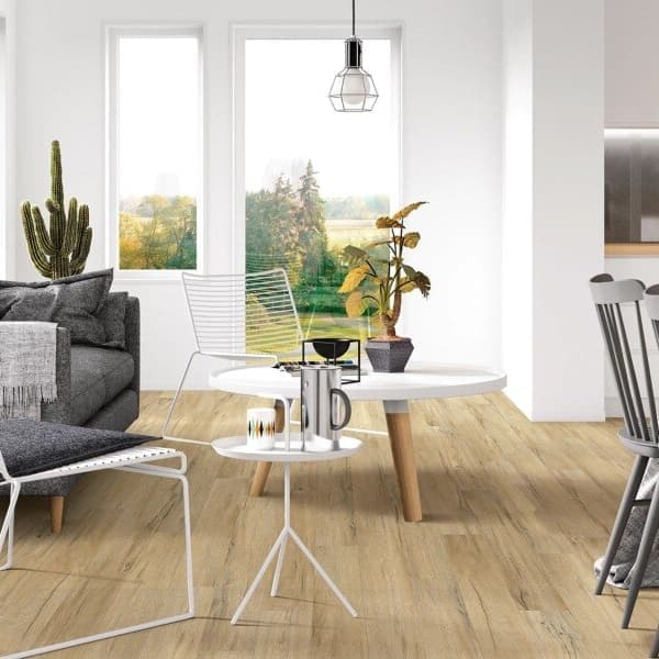 Living room with COREtec Plus 5" waterproof vinyl planks in light wood finish