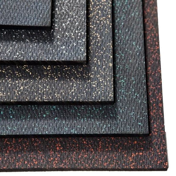Stack of premium rubber mats in different color flecks, including red, blue, gray, and black.