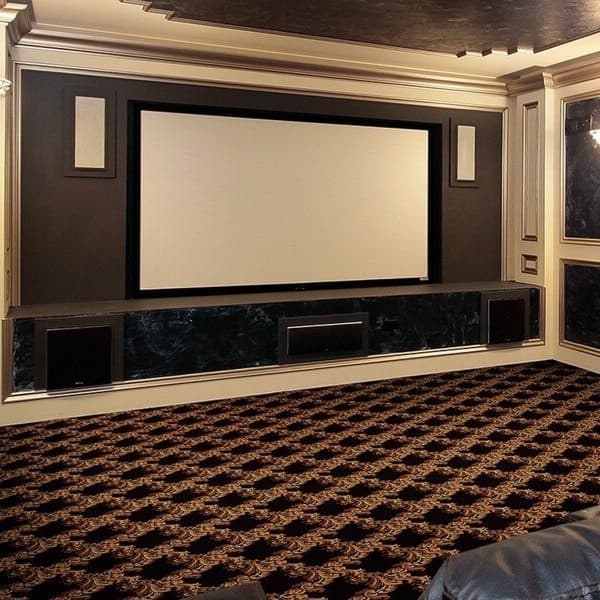 Home theater with Joy Carpets Corinth carpet in brown and black geometric pattern covering the floor