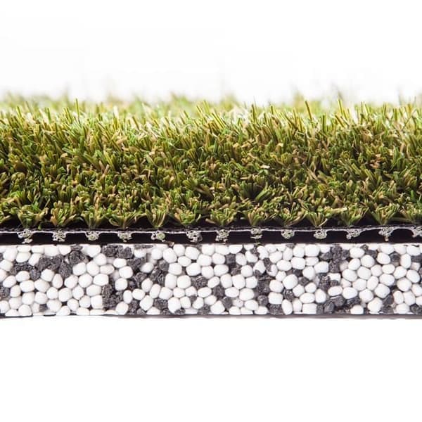 Shaw Play Pad 5 artificial grass — cross-section showing green polypropylene turf over a layer of white and gray cushioning