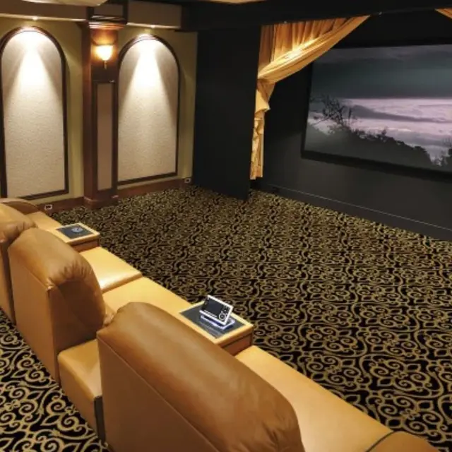 Home theater with Joy Carpets Cathedral Carpet in black and gold swirl pattern