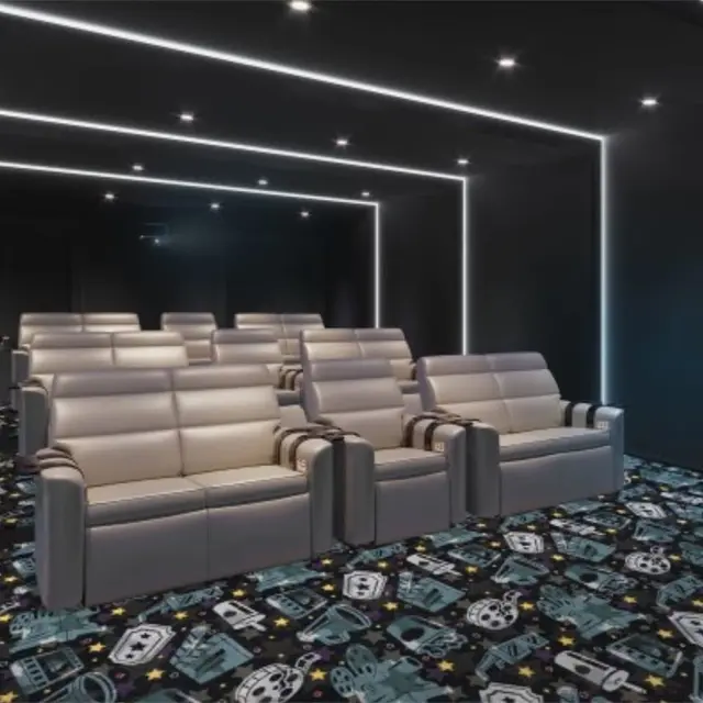 Home theater with Joy Carpets Motion Picture Carpet in Navy — patterned carpet featuring film reels, cameras, and stars