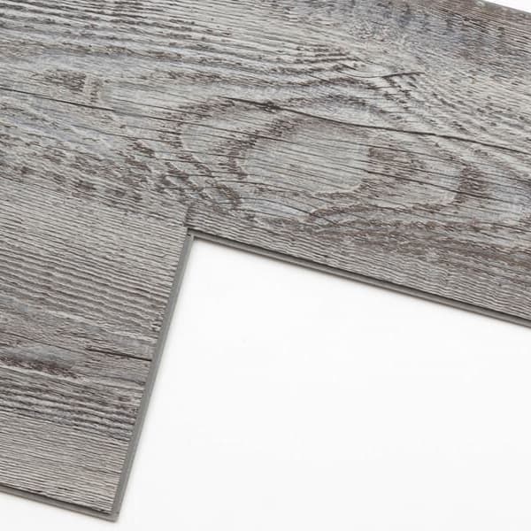 Vinyl plank flooring on white background.