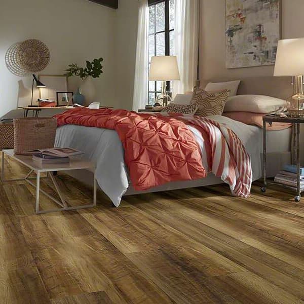 Shaw Endura 512C Plus 7" rigid core vinyl plank flooring in Amber Oak bedroom