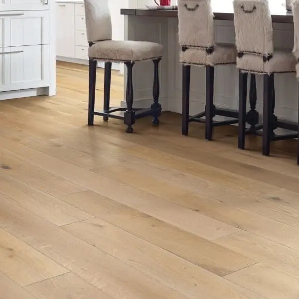 Shaw Castlewood Oak Engineered Wood flooring in Hearth — light oak finish with natural grain, installed in a kitchen with