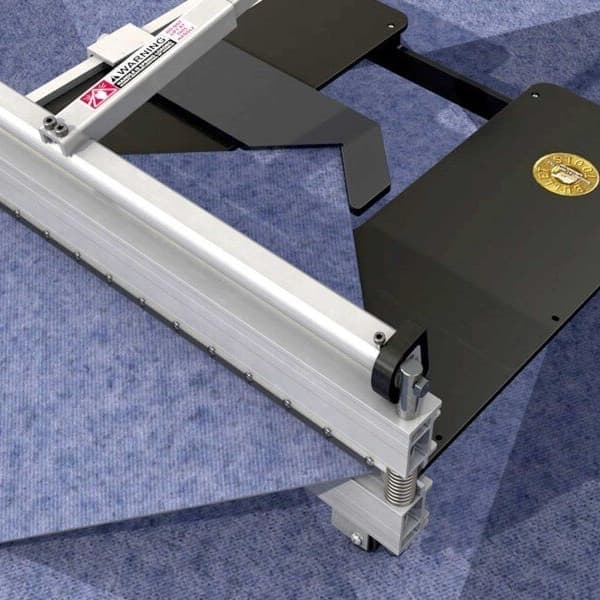 Magnum Series Shear Tile Cutter — silver aluminum frame with black base plate on blue textured surface