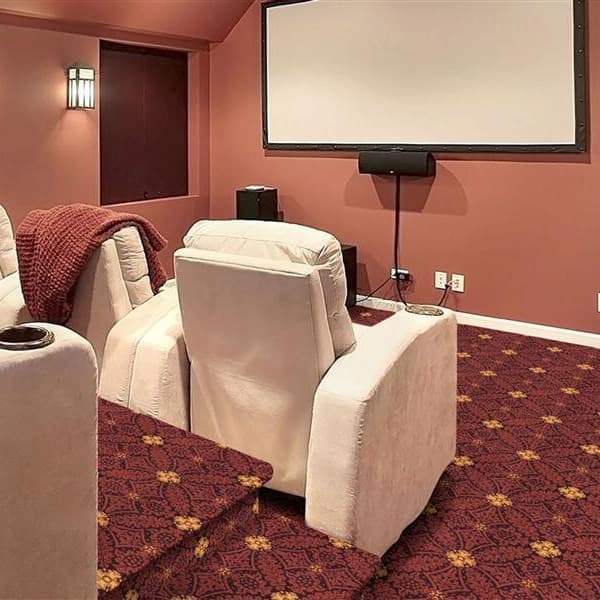 Home theater with burgundy carpet featuring a floral pattern under white recliners