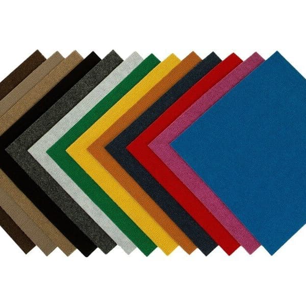 Ribbed carpet tile swatches in brown, tan, black, gray, green, yellow, orange, navy, red, pink, and blue