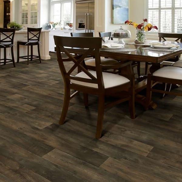 Shaw Great Plains 12' wide vinyl sheet flooring in Colorado — dark wood grain pattern