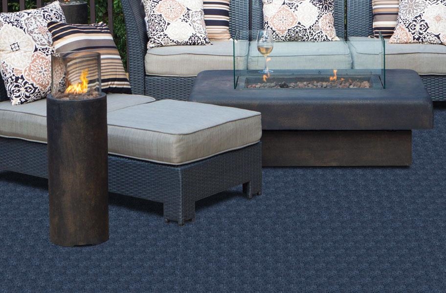 Blue carpet on an outdoor patio