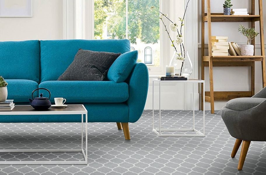 Carpet FAQ: geometric patterned carpet roll in a living room setting
