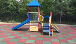 Image of a playground set with our Jamboree Playground Tiles™. 
