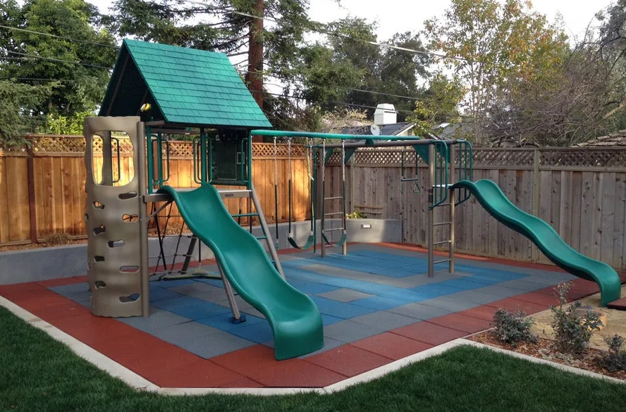 Red, Blue, and Grey Safe Play Tiles used in a backyard playground