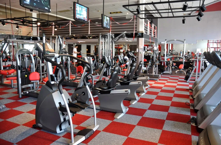 4 Reasons to Choose Carpet for Gym Flooring: Carpet tiles are an approachable, durable option for gym flooring. Discover if they could be the right choice for you.