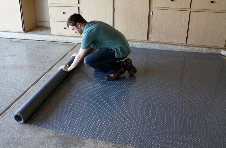 How to Choose Garage Flooring: Tiles, Rolls, Epoxy & More. Your definitive guide to choosing the best garage flooring at the best price.