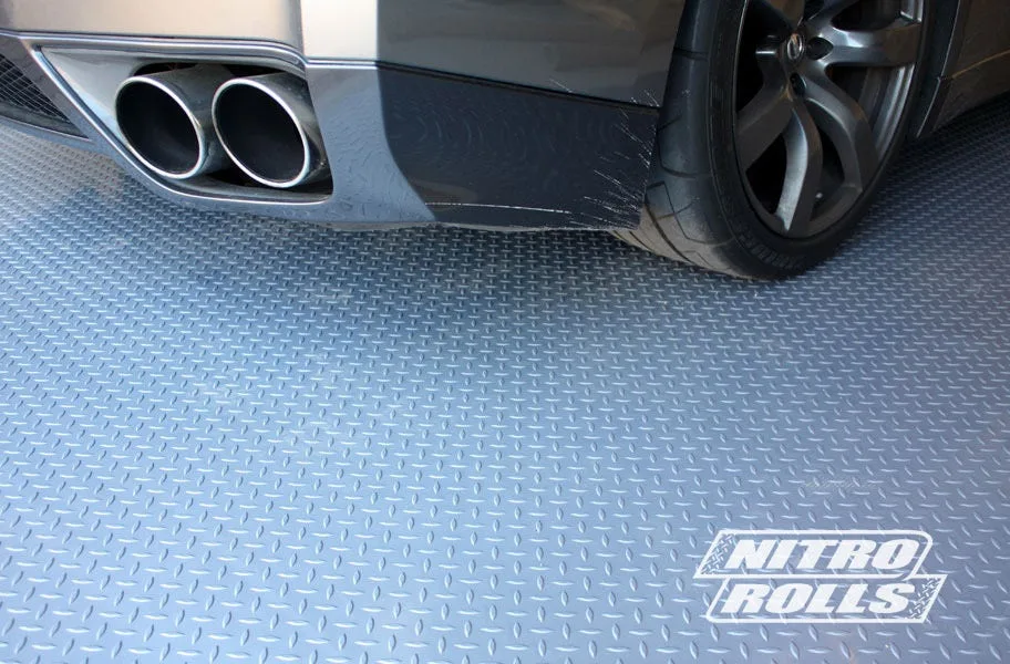 How to Choose Garage Flooring: Tiles, Rolls, Epoxy & More. Your definitive guide to choosing the best garage flooring at the best price.