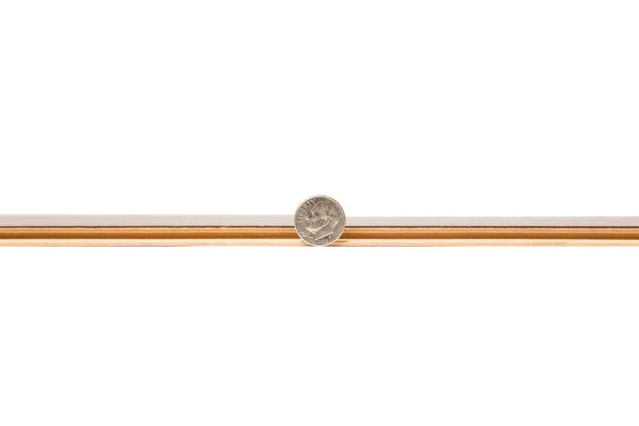 Laminate flooring thickness compared to a dime