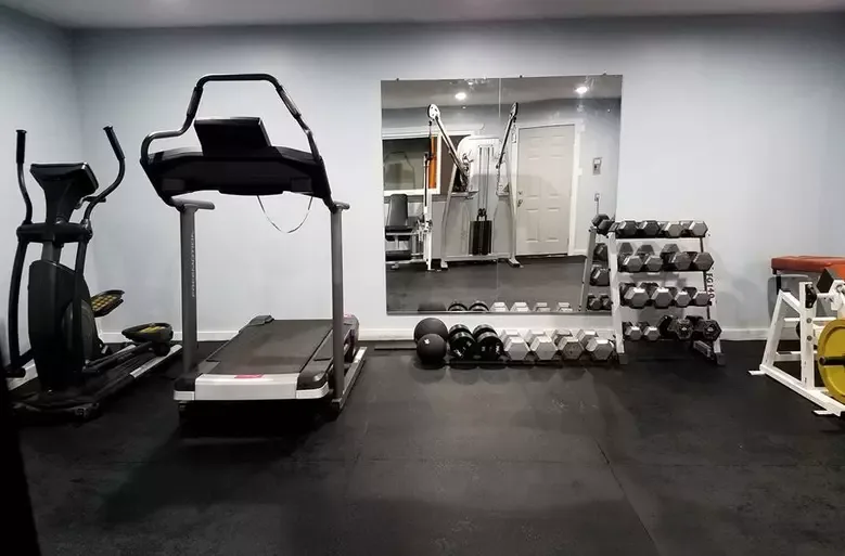 Traxxon rubber gym mats in a home gym