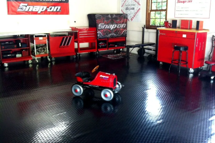 How to Choose Garage Flooring: Tiles, Rolls, Epoxy & More. Your definitive guide to choosing the best garage flooring at the best price.