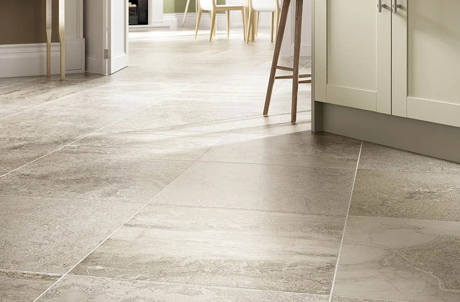 Large format stone-look tile flooring in a kitchen setting