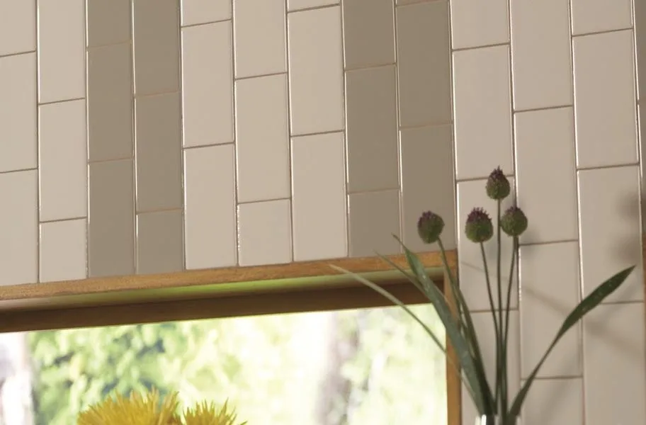 Dark grout and light subway tile in a kitchen setting