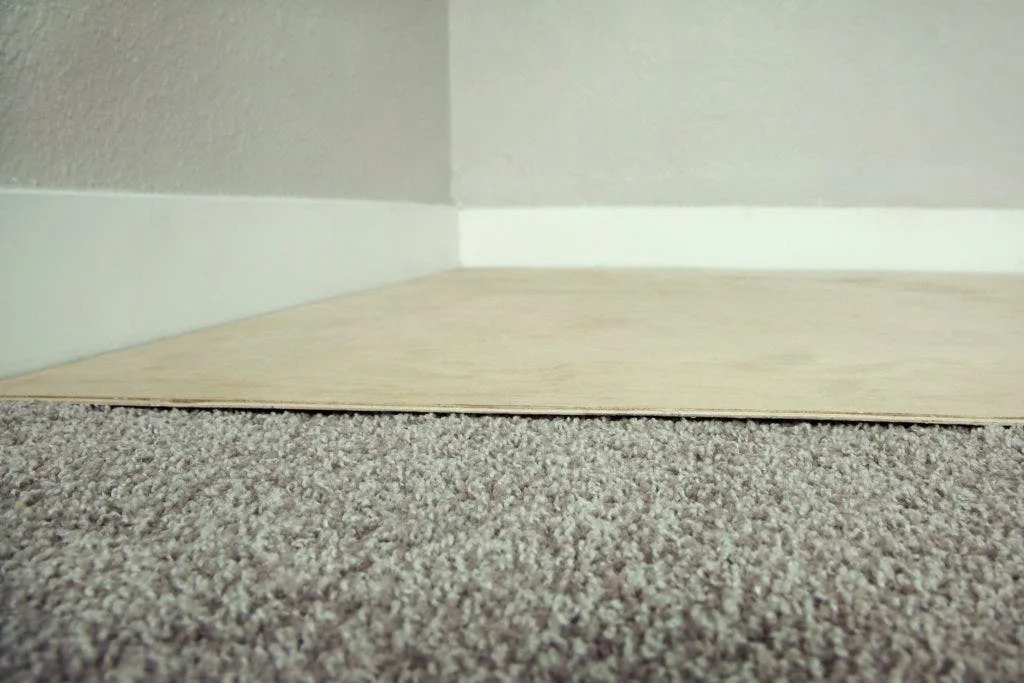Plywood over carpet