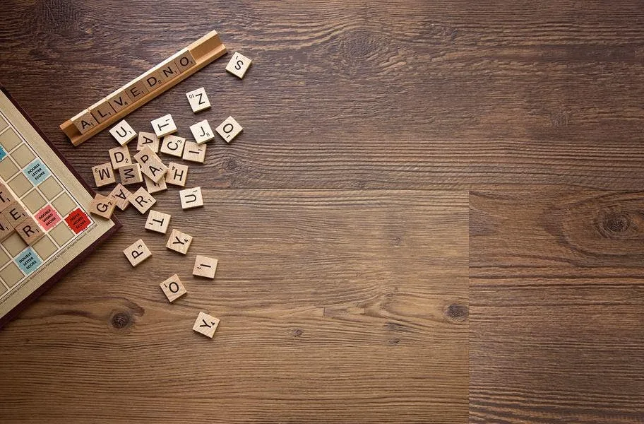 vinyl plank flooring with scrabble tiles