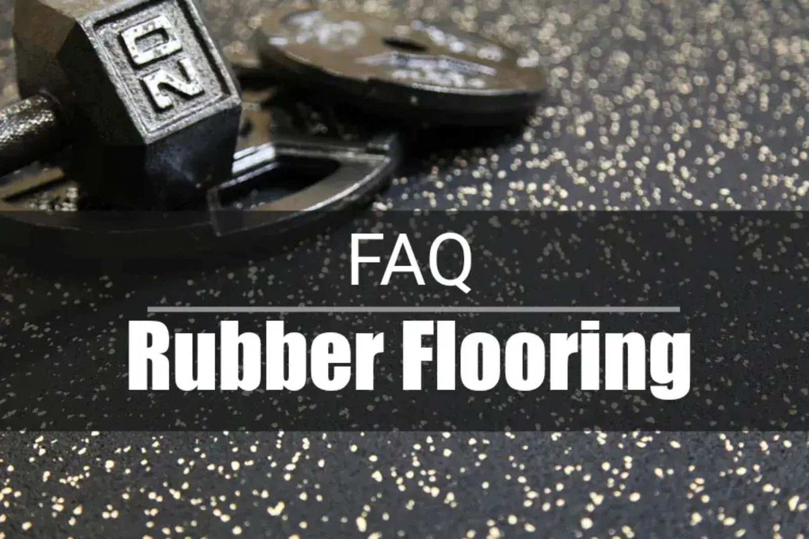 Rubber Flooring FAQ: dumbbell and weight plates on speckled rubber gym flooring