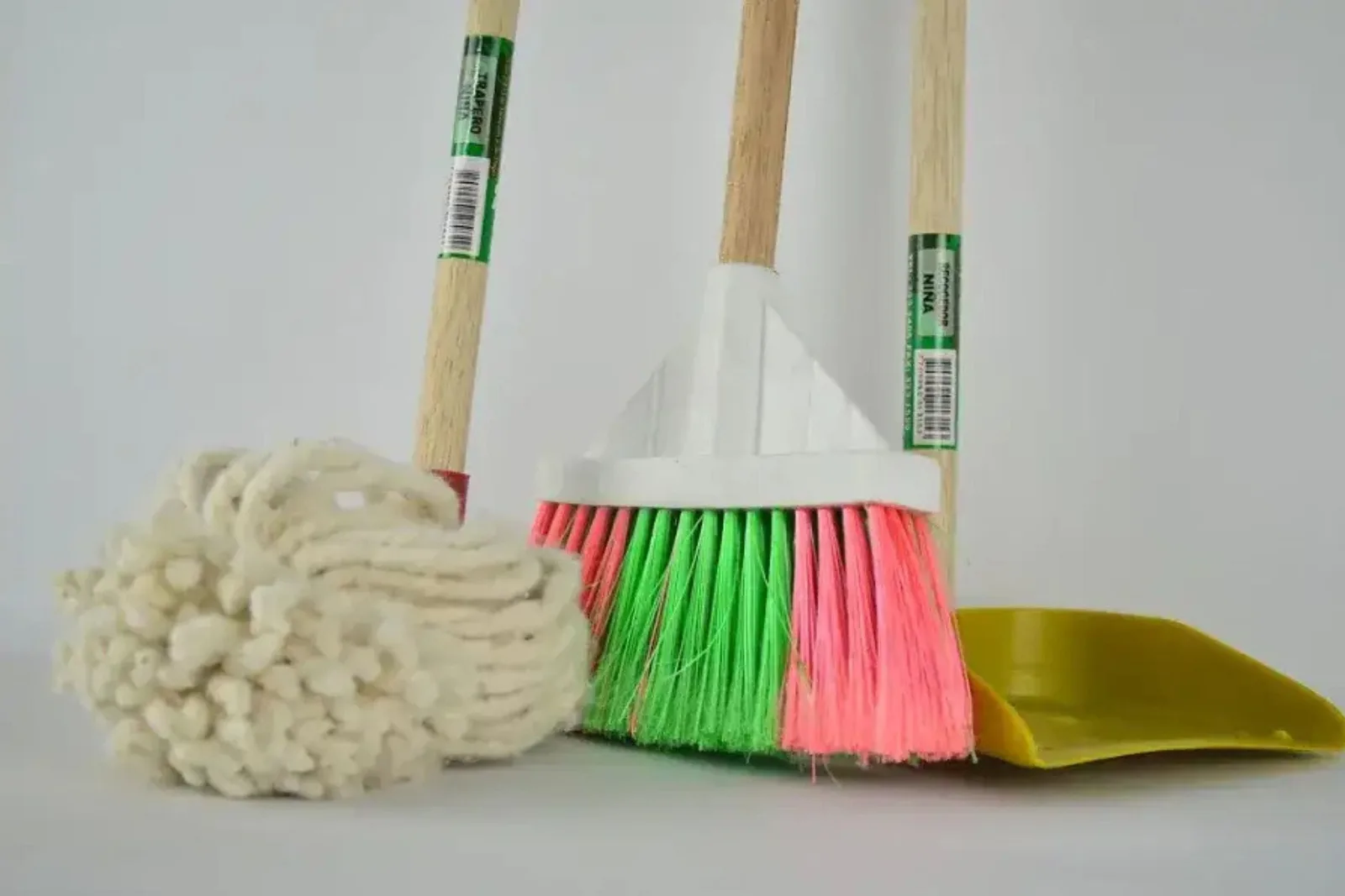 Mop head, broom and dustpan for cleaning rubber gym flooring