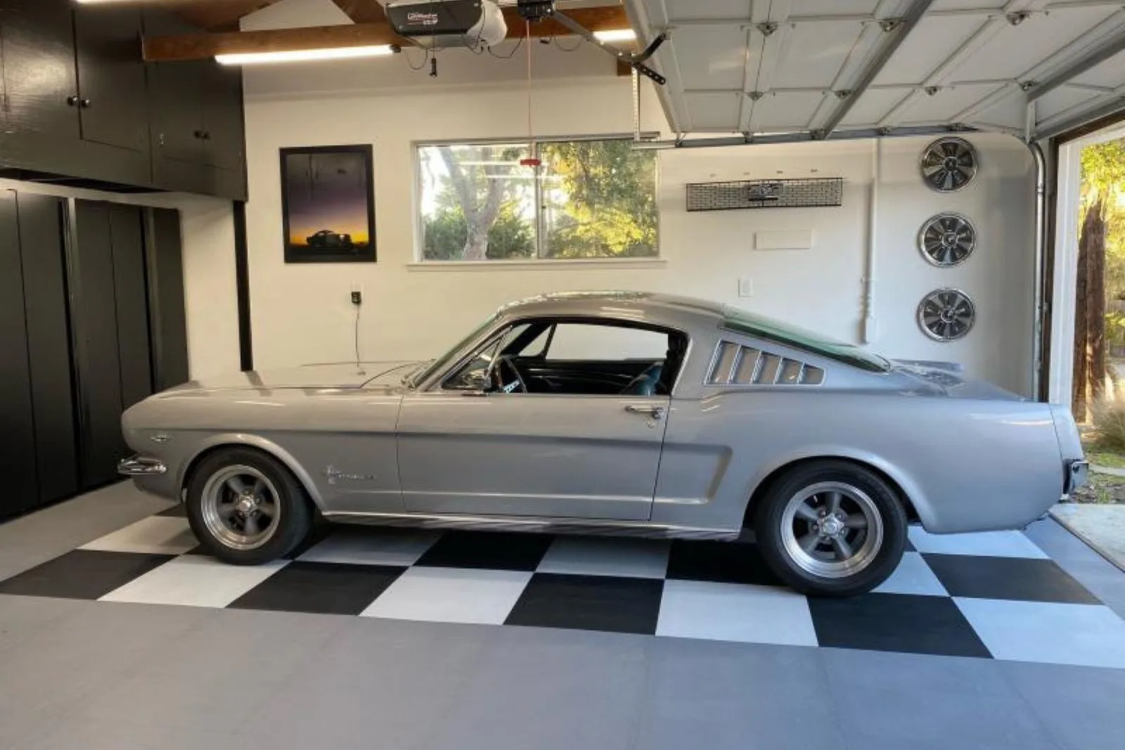 Classic silver Mustang on black and white Slate Flex Nitro garage floor tiles