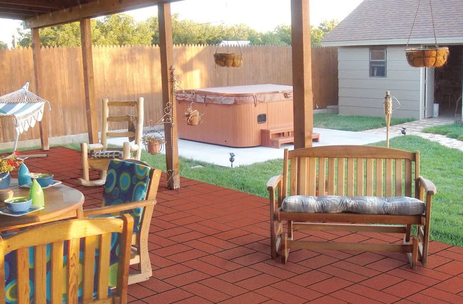 Covered patio with a glider bench on red West Coast paver tiles