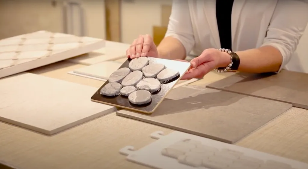 How to Choose Tile: stone-look pebble floor tile for bathrooms