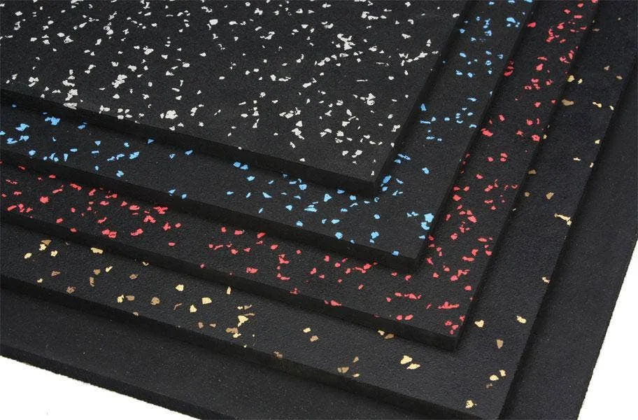 Stack of 4'x6' premium rubber mats with white, blue, red and tan flecks