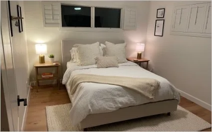 Bedroom with light wood-look TritonCORE Pro rigid core vinyl planks