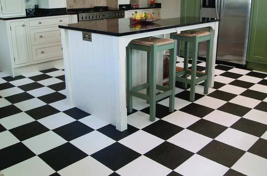 FlooringInc 2020 flooring trends: black and white flooring in a kitchen setting.