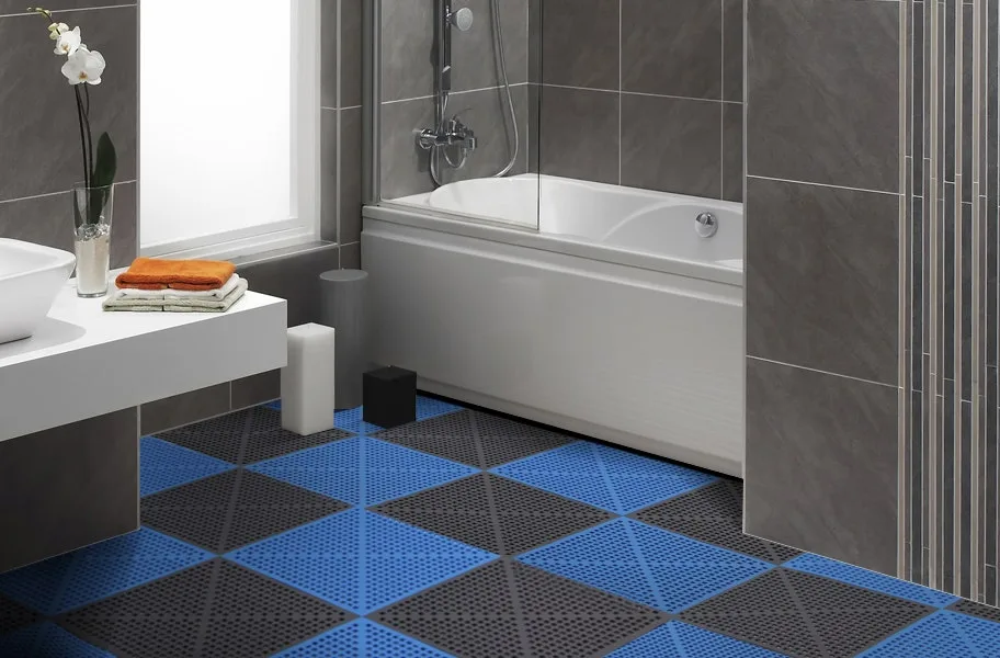 Bathroom with blue and gray perforated soft flex tiles around a tub