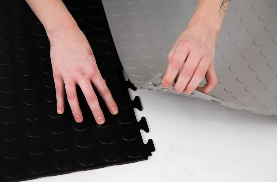 Food Truck Flooring: Black and Gray Coin Flex Nitro Tiles being installed