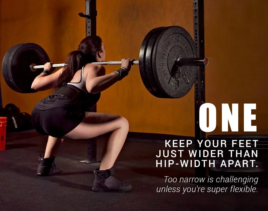 One: keep your feet just wider than hip-width apart - woman back squatting a barbell