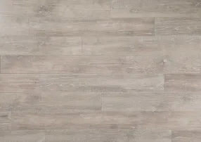 Close-up of durable light gray wood-look vinyl plank flooring with a realistic wood grain, a water-resistant and easy-to-clean alternative to hardwood.