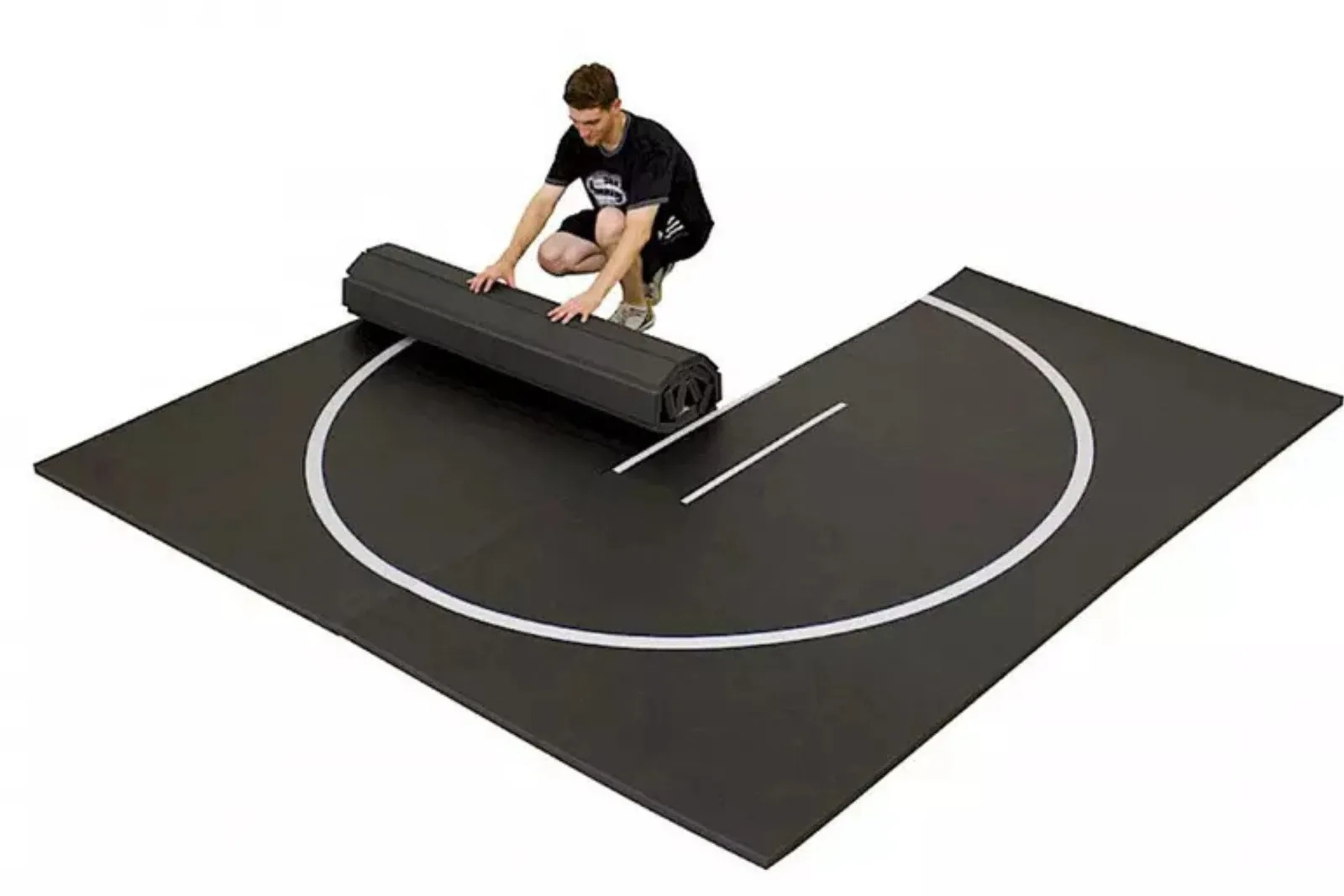 Delux home wrestling mat or rollout wrestling mat in black and white, featuring a man unrolling the portable, shock-absorbent mat for home practice.