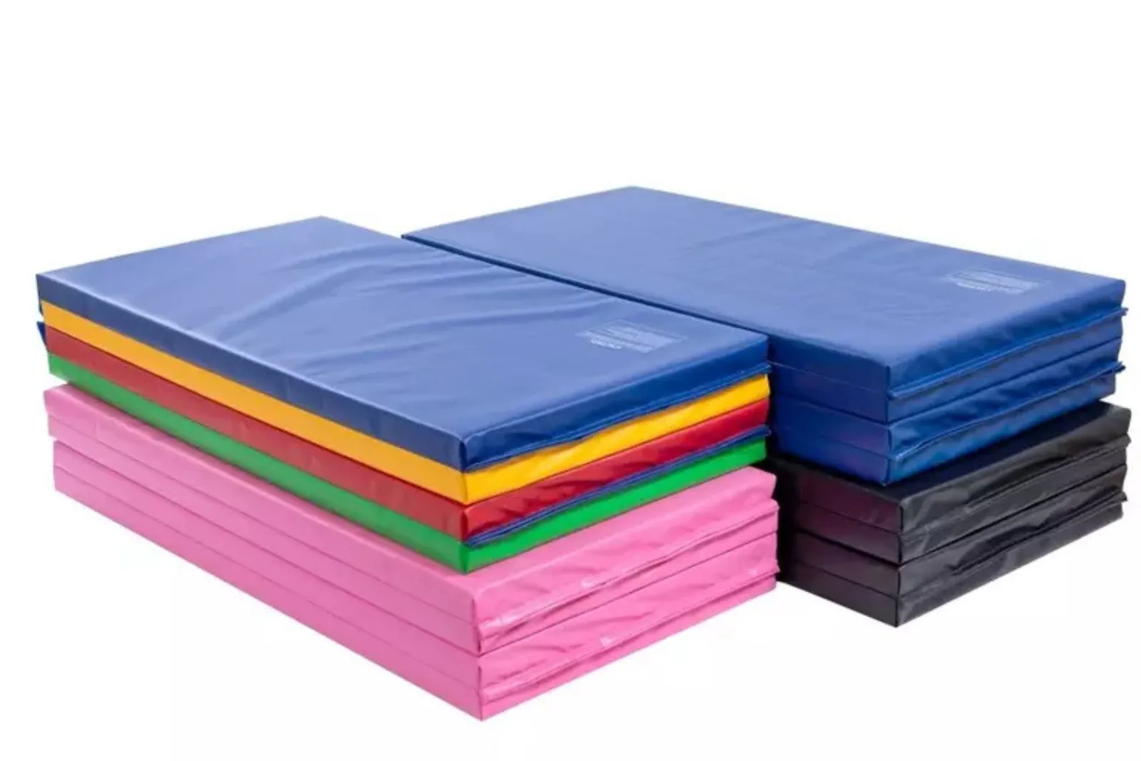 Folding foam panel mats in various colors are stacked, demonstrating a portable and durable wrestling training and practice solution for tumbling and exercise.