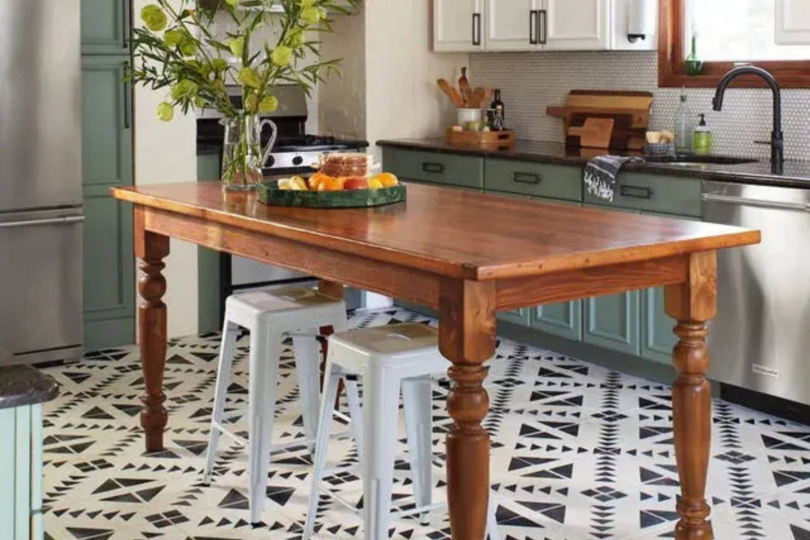 Modern kitchen with durable black and white patterned vinyl flooring, a water-resistant and stylish solution for a high-traffic area.