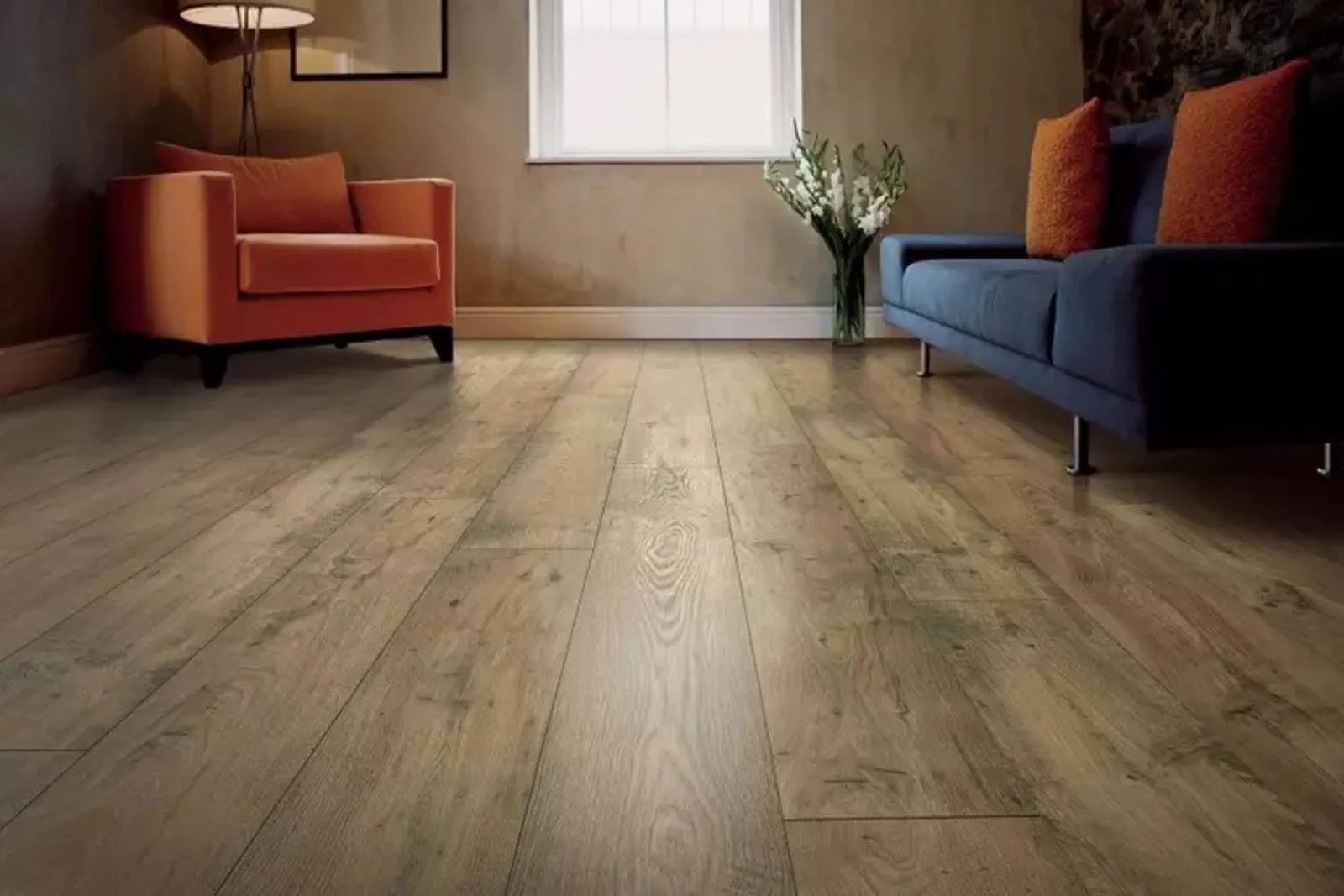 Cozy living room with durable medium wood-look vinyl plank flooring, a water-resistant and easy-to-clean alternative to hardwood.