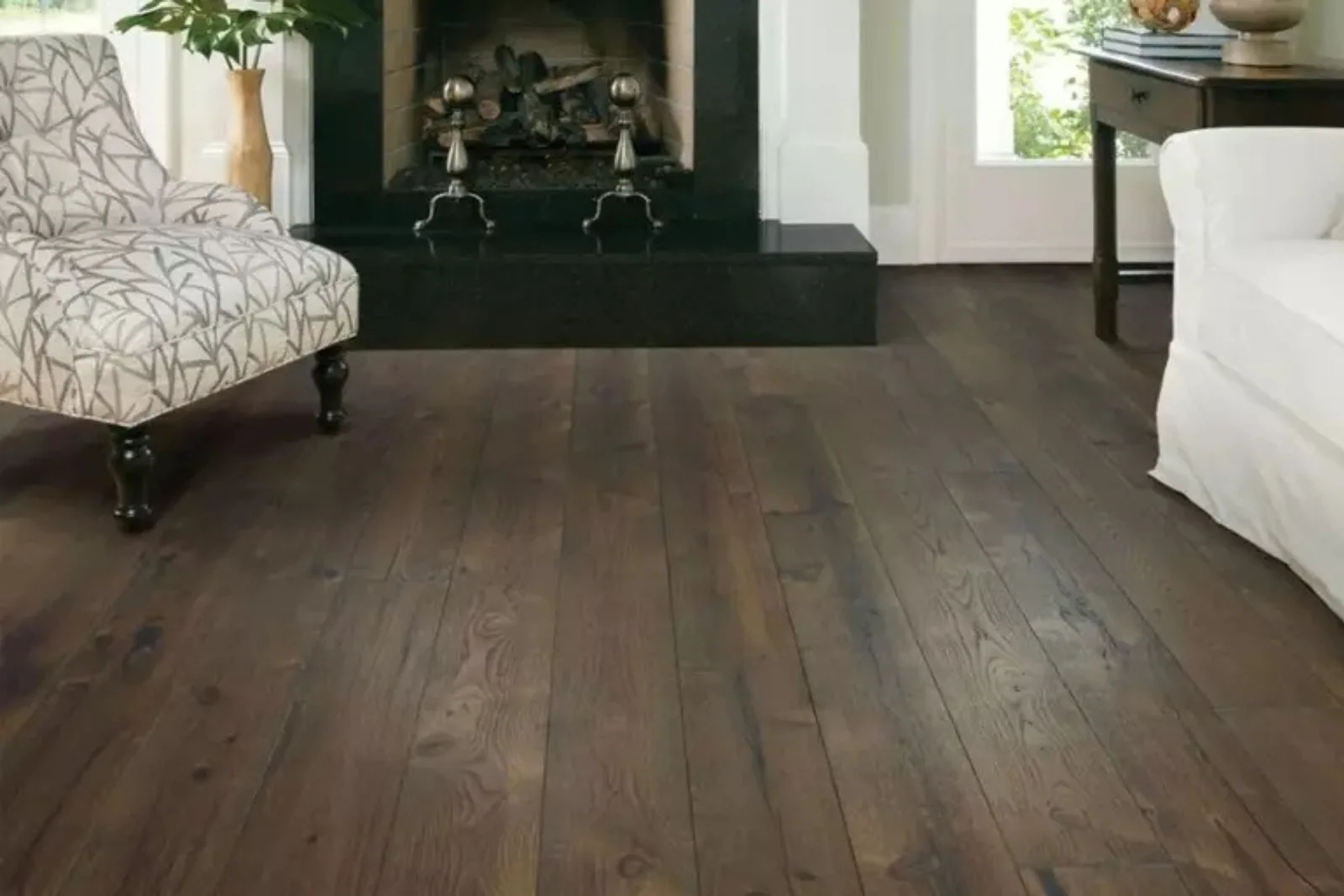 Elegant living room with a durable dark brown wood-look vinyl plank flooring and a fireplace, a stylish and water-resistant alternative to hardwood.