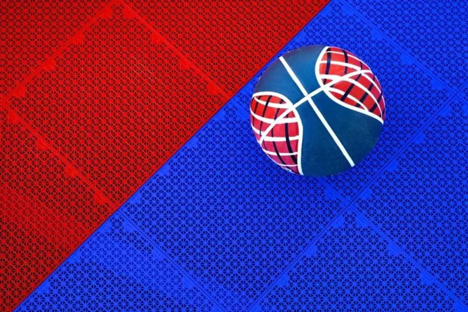 Vented interlocking outdoor basketball court tiles in vibrant red and blue, providing a durable, quick-draining, and high-performance playing surface.