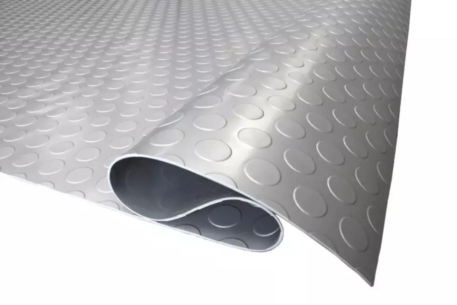 A close-up of a roll of gray coin-top rubber garage flooring, showing the thick, durable material and the raised circular pattern. This roll-out garage mat provides anti-slip protection and is waterproof for a garage or workshop.